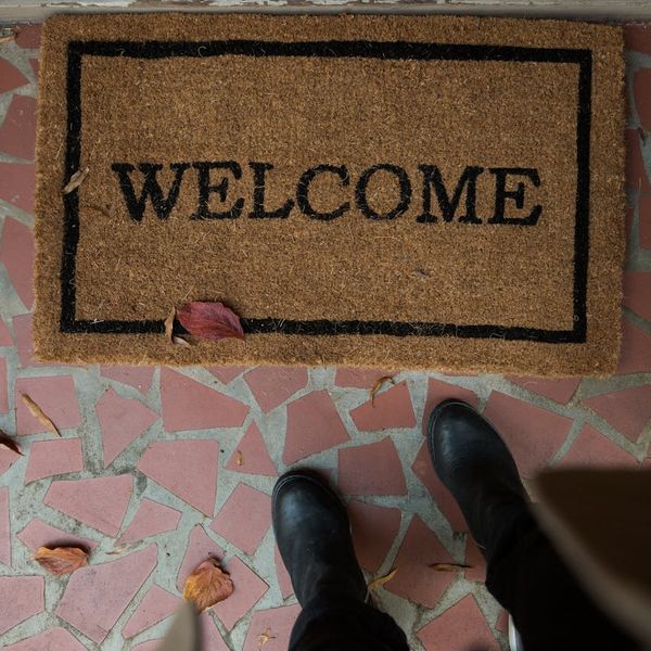 A welcoming and clean studio interior with mats ready for a class.